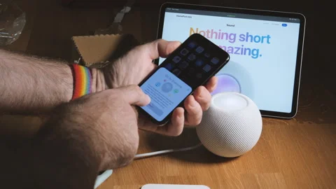 Setting Up HomePod with iPad and iPhone Pro Stock Footage 276603568