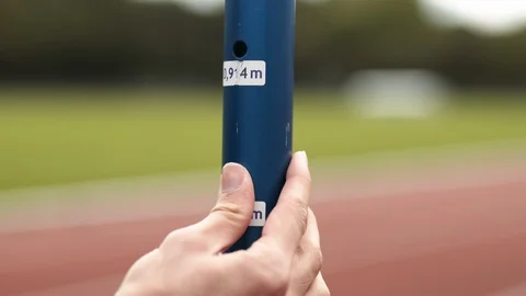 Setting up hurdle height from min to max track and field close up [6K50p] Stock-Footage 127026077