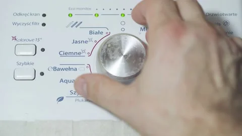 By setting the knob on the washing machine in the right position, you can adjust Stock Footage 145717580