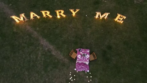 The setting of a marriage proposal, view from above. The table arranged in the Stock Footage 157754577