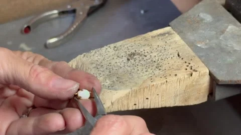 Setting opal in yg setting Video stock 242936072