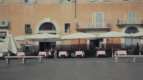 Setting up outdoor restaurant in rome Stock Footage 10881490