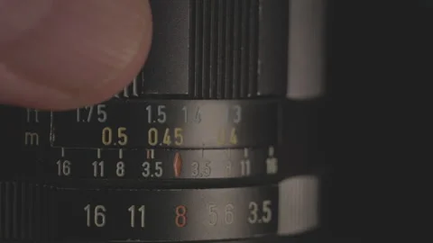 Setting parameters on the vintage lens. Stock Footage 286424136