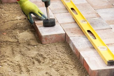 Setting paver Stock Photos