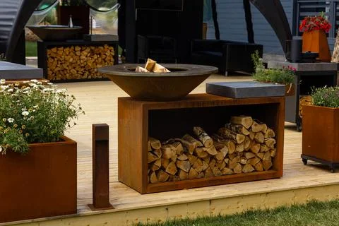 Setting up a picnic area in the backyard. Decorating the lounge area with f.. Stock Photos