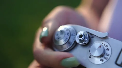 Setting up retro camera preparing to take picture, close-up of checking settings Stock Footage 159633962