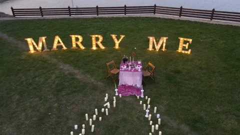 The setting of a romantic dinner in which there will be a marriage proposal, on Stock-Footage 157755733