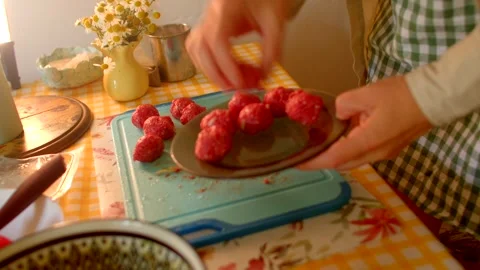 Setting up savory meatballs on dark plate with cozy table decor Stock-Footage 320954978