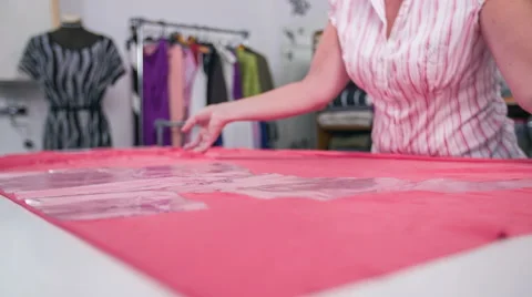 Setting sewing textile before marking with sample plastic measure foils Stock Footage 41012965