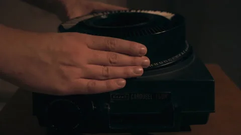 Setting up a slide projector kodak carousel Stock Footage 221786851
