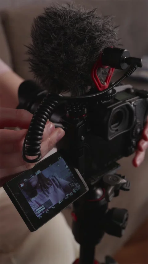 Setting up a smartphone for filming a craft blog vertical shot Stock Footage 337451985