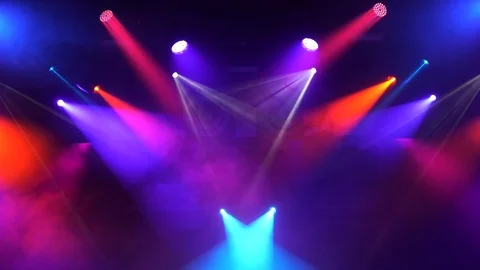 Setting up the stage light before the show. Bright multi-colored rays Stock Footage 124778183