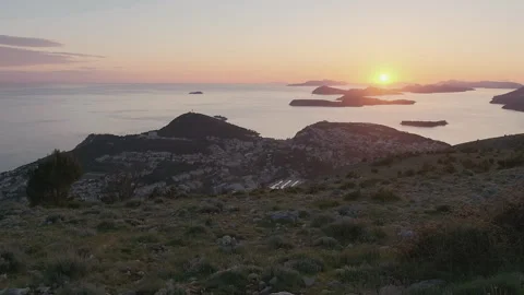 Setting sun above horizon from Mount Srd, Dubrovnik, Croatia, 4k Stock-Footage 274457335