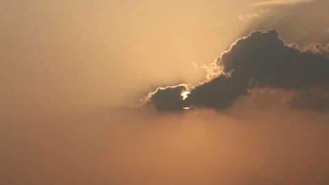 Setting sun behind a cloud, 500fps, slow-motion, Stock Footage 278520334