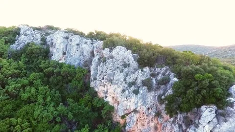 Setting Sun Behind Rocks Aerial - Drone Shot v2 Stock Footage 123876373