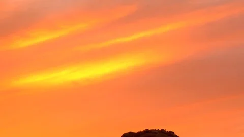 Setting sun behind rocks in desert Arizona B Stock Footage 125278764
