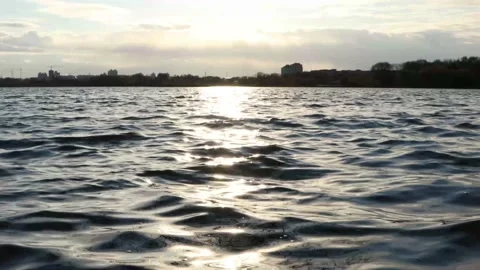 The setting sun falls on the water. Sunset and the sea. Stock Footage 130271670