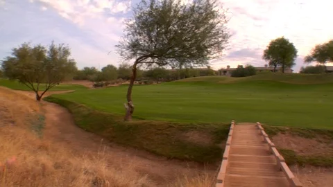 Setting sun golf course with trees Stock Footage 125278456