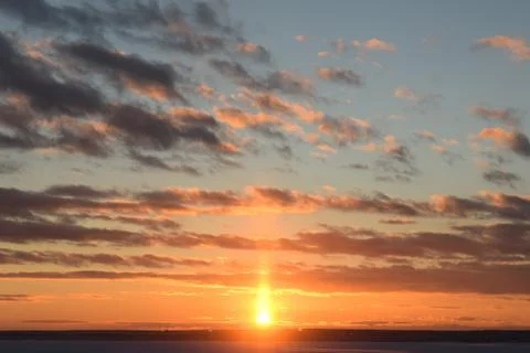 The setting sun, the horizon Stock Photos