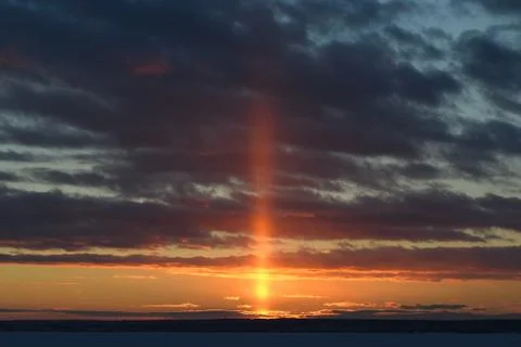 The setting sun, the horizon Stock Photos