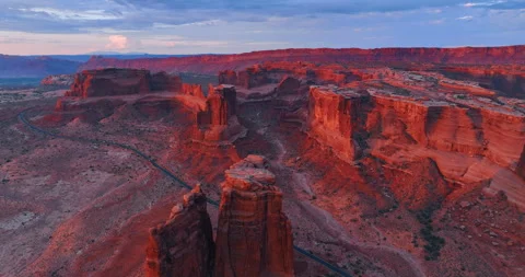 Setting sun lighting the red rocks of amazing Arches National Park, Utah, USA. Stock Footage 316970465