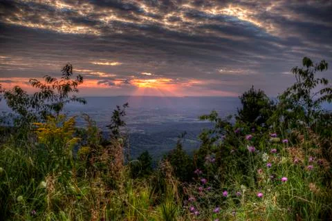 Setting sun mountains 写真素材