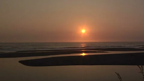 Setting Sun on the Oregon Coast Stock Footage 327887382