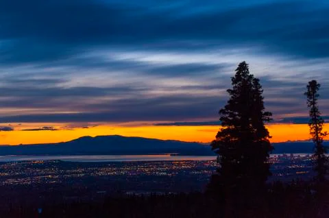 The setting sun over Alaskas Mount Susitna, locally known as The Sleeping Lady Stock Photos