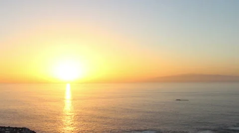 Setting sun over horizon of Atlantic ocean, top view,Playa Paraiso, Tenerife Video stock 59999737
