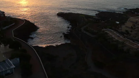 Setting sun over horizon of Atlantic ocean, aerial view, Playa Paraiso, Tenerife Video stock 59999766