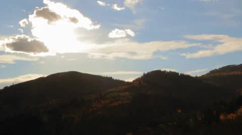 Setting Sun over Mountain Fall Colors Stock Footage 25751124