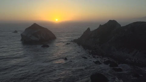 Setting Sun Over the Ocean Stock Footage 101015900