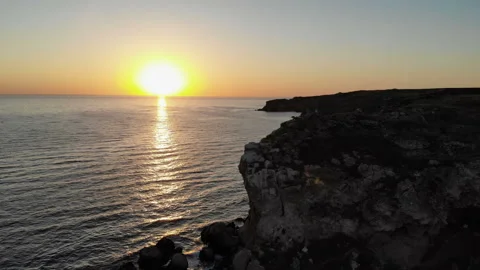 Setting Sun Over Rippling Ocean Stock Footage 95680621