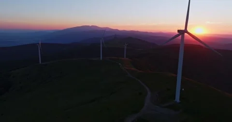 Setting Sun Over Vibrant Balkan Mountainscape Wind Turbines Spinning Fast Soviet Stock Footage 300486668