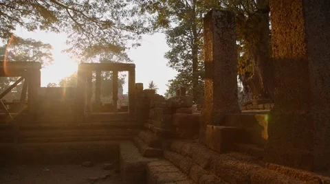 Setting sun plays in the ruins of an ancient temple, steadicam shot Stock Footage 49407499
