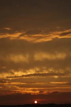 Setting Sun Rays Reflected the Rosy Clouds Foto stock