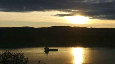 The setting sun reflected in the water of the Kola Gulf. Stock Footage 83156290