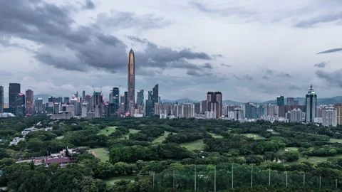 The setting sun sets on the high-rise buildings in the prosperous cities Stock Footage 138795050