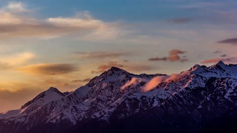 Setting Sun Shines on the Mountains Stock Footage 157640686