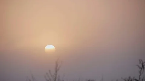 The setting sun in the sky of pink color Stock Footage 72921172