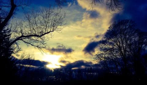 The setting sun in winter over Dillingen Stockfoto's