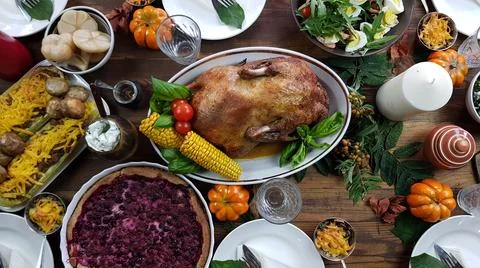 Setting the table for a festive dinner in honor of Thanksgiving. on a wooden  Stock Photos