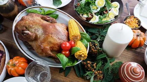 Setting the table for a festive dinner in honor of Thanksgiving. on a wooden  Stock Photos