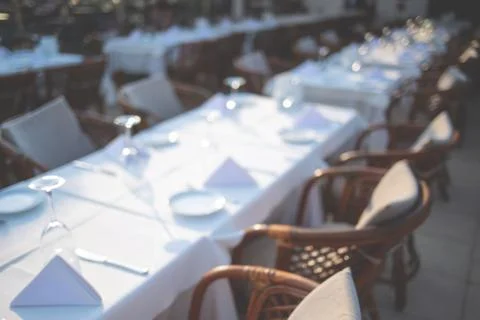 Setting table in restaurant. Stock Photos