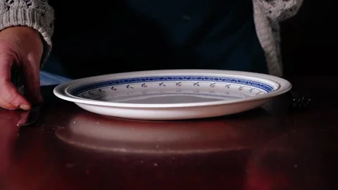 Setting table for single person dinner Stock Footage 255729296