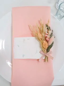 Setting the table for a wedding. White tablecloth, flowers, cutlery. Holiday Stock Photos