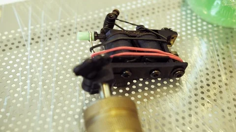 Setting up a tattoo machine Stock Footage 122293746