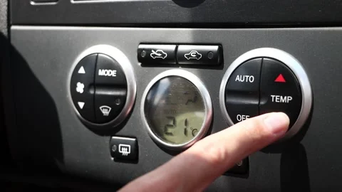 Setting the temperature in the car air conditioner Stock Footage 136259354