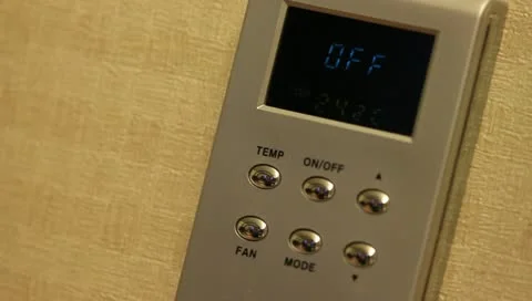 Setting thermosat temperature Stock Footage 11350279