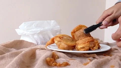 Setting the time on a brown watch Stock Footage 146493181